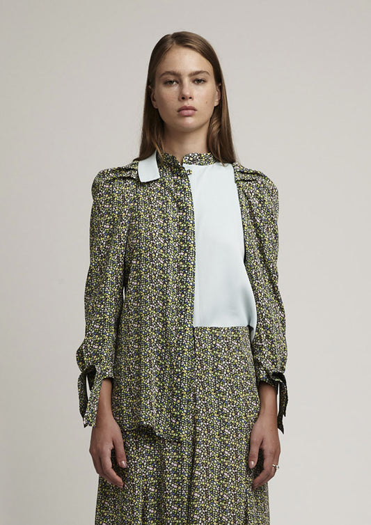 CAMISA COM MANGA BUFANTE