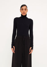 BLUSA DE GOLA ROLE