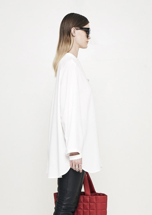 BLUSA AMPLA DECOTE ASSIMÉTRICO