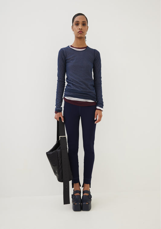 CALÇA TK COM BARRA ASSIMÉTRICA