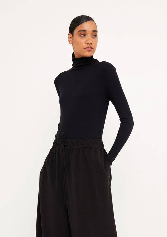 BLUSA DE GOLA ROLE