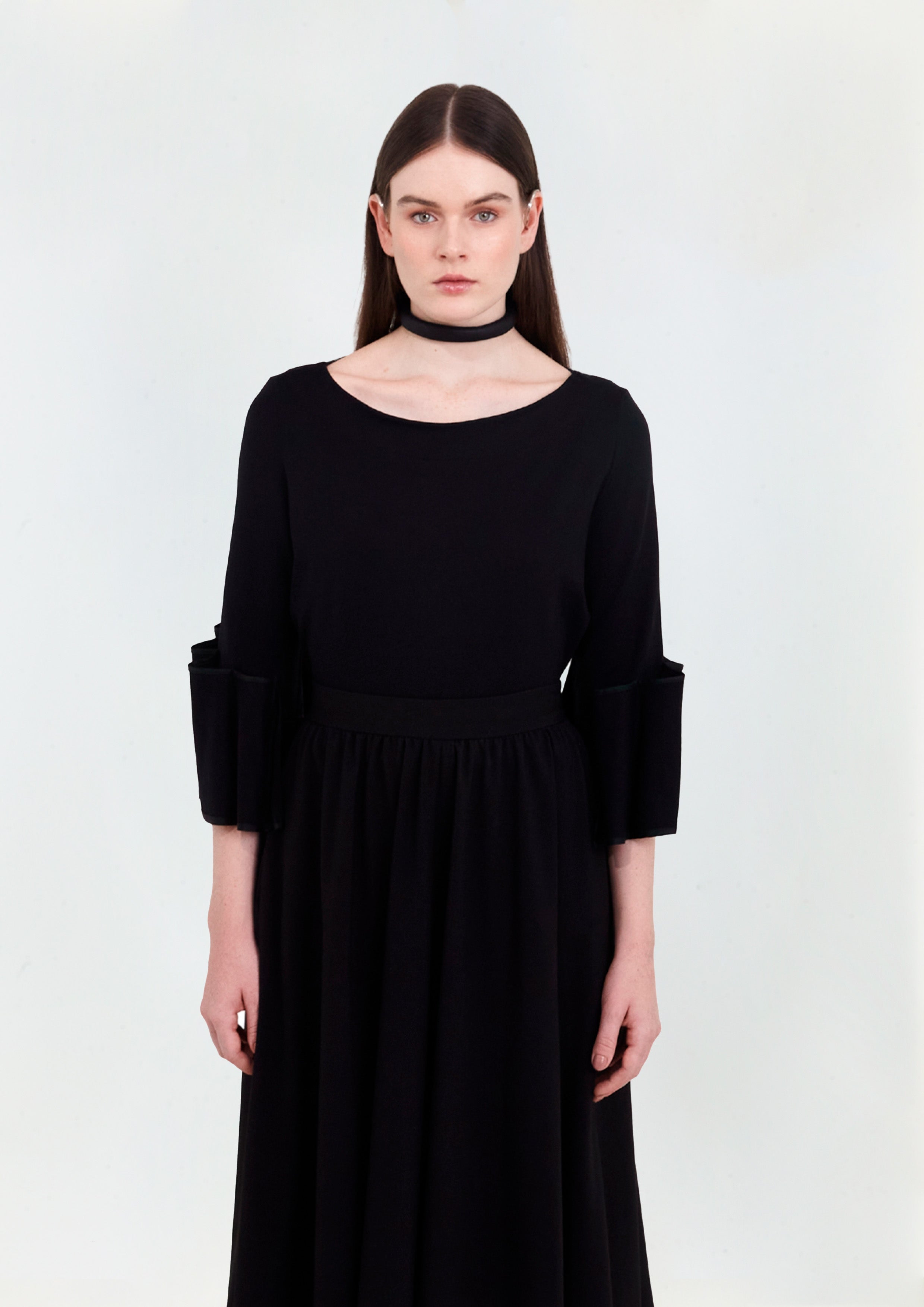 BLUSA MALHA COM DETALHES NAS MANGAS