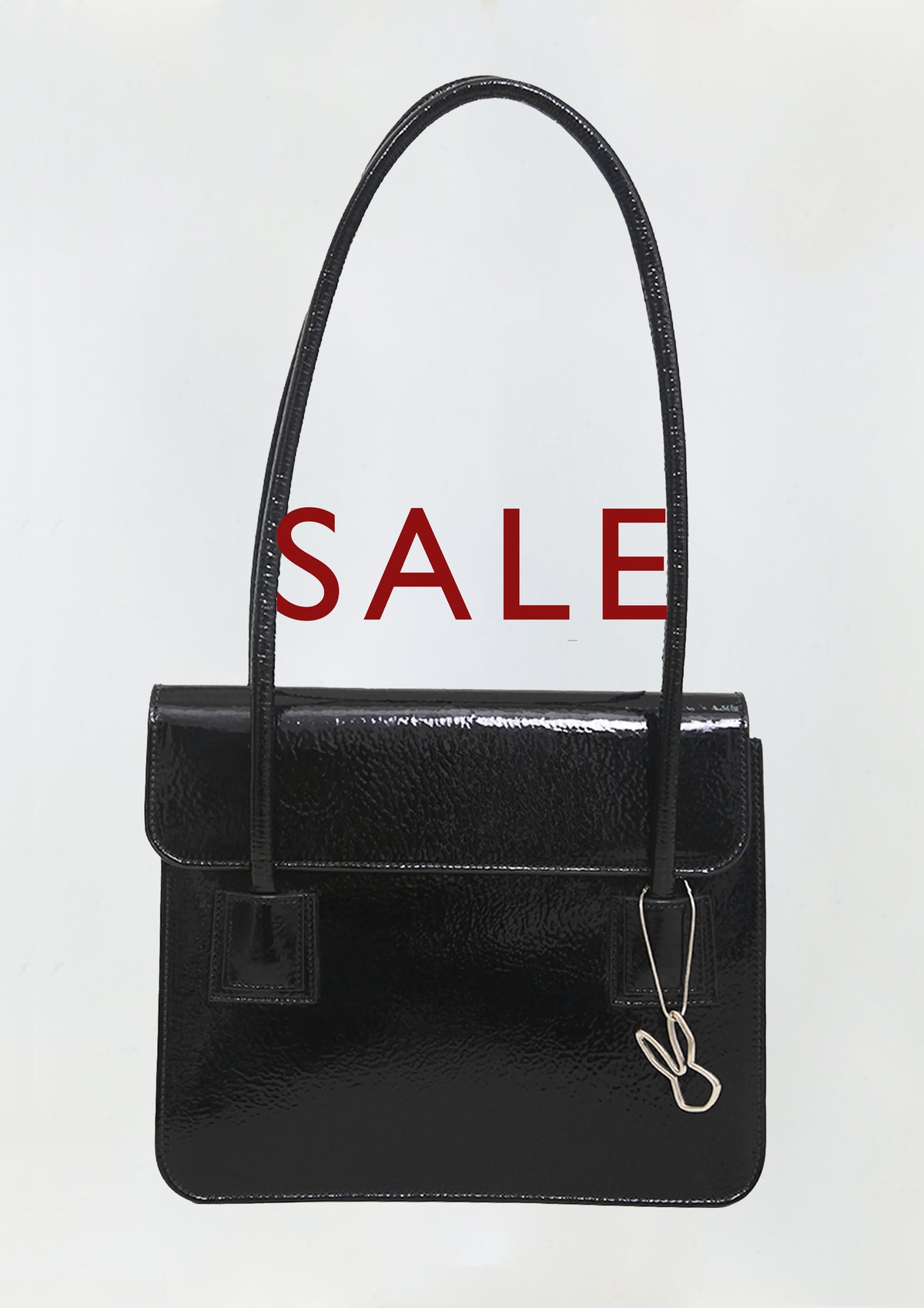 BOLSA DE FOLE COM ABA COURO VERNIZ